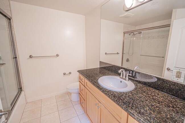 Building Photo - Spacious 3-Bedroom Condo with Underground ...