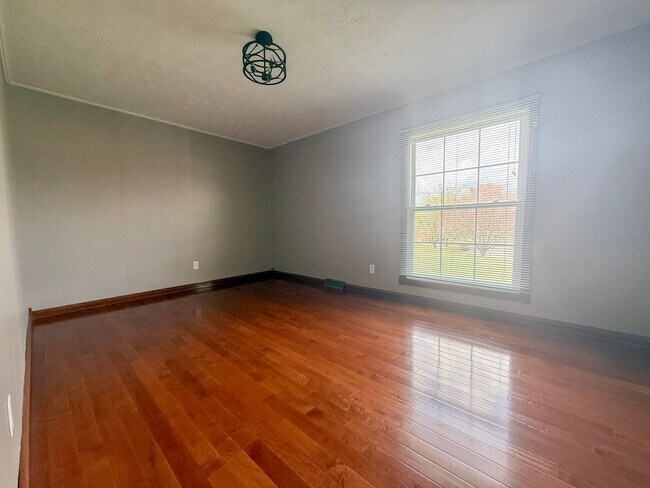 Building Photo - Spacious 3-Bedroom Home with Huge Yard, Covered Porches & Storage Building