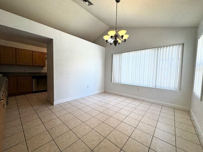 Building Photo - 3 BEDROOM WITH FIREPLACE AND LVP PLANK FLO...