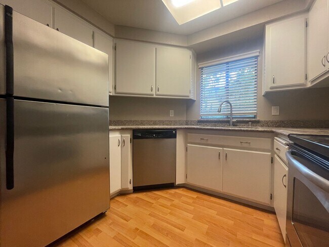 Building Photo - Remodeled 2 Bedroom 2 Bath Condo in Park-like Cedar Gables Community!