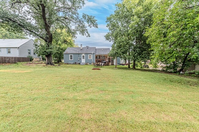 Building Photo - Back porch with a large yard!