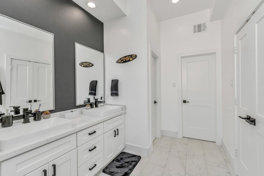 Primary Bedroom with two closets and private en-suite bath - 1815 Elite Dr