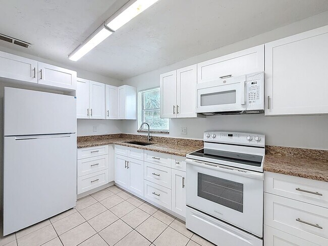 Building Photo - Desirable 55 plus community condo unit with a view of the lake on the 2nd Floor.