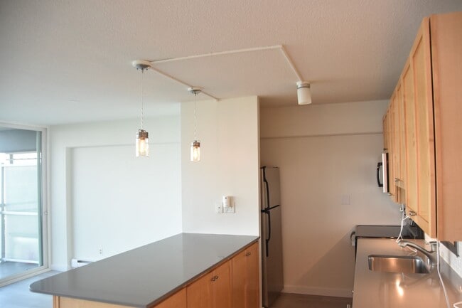 Building Photo - Sky Terrace 2 Bedroom 1.5 Bath Condo with ...