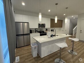 Building Photo - Furnished with Modern Class!
