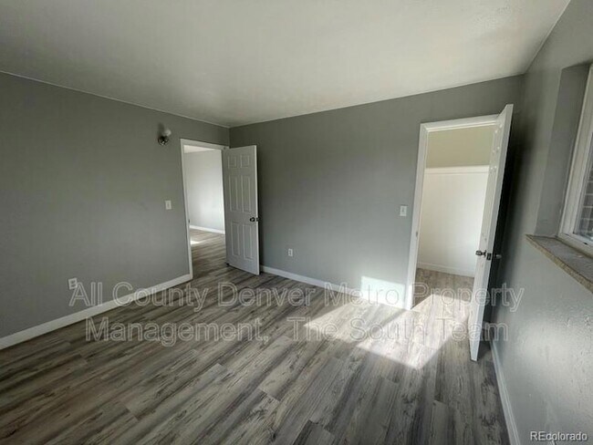 Building Photo - 9597 E 19th Ave