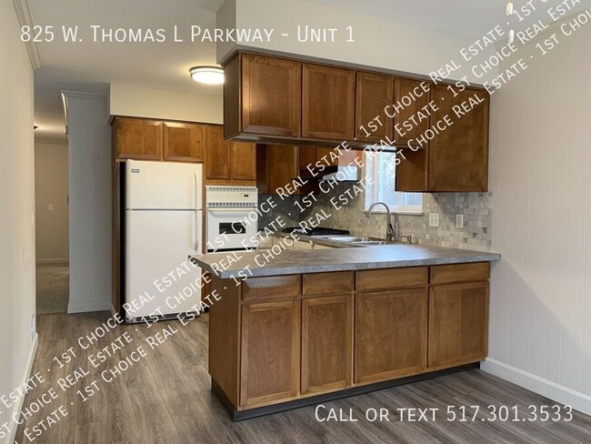 Building Photo - Spacious 3-BDR 1-BTH Apt w/ Garage & Laund...