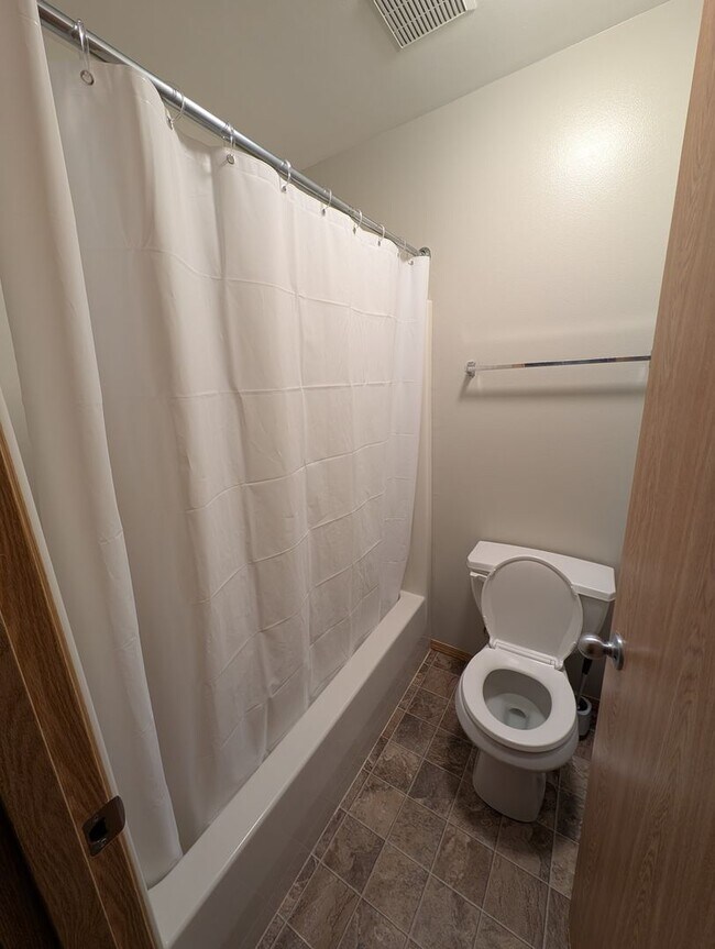 Building Photo - A Gardeners Oasis! 3 Bedroom Townhome for ...