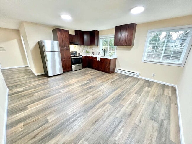 Building Photo - Elevated 3-Bedroom Home with Secure Garage & Cozy Living Space