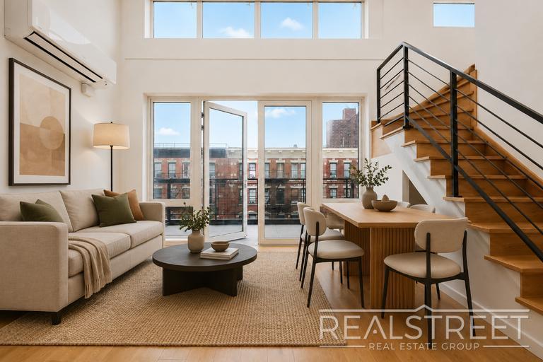 Building Photo - Sun-Filled Penthouse Duplex with Massive Private Terrace & Bonus Storage Room