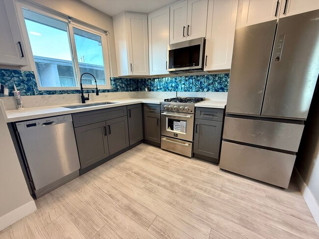 Building Photo - **FREE JUNE**    Freshly Renovated 2 bedro...