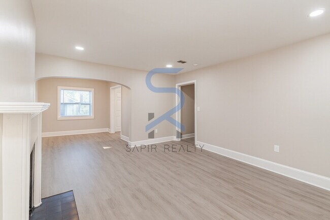 Building Photo - Move in before December 31st and choose your reward: a $250 Amazon Gift Card or a 55" Smart TV!