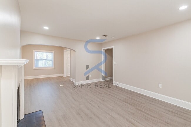 Building Photo - Move in before January 15th and choose your reward: a $250 Amazon Gift Card or a 55" Smart TV!