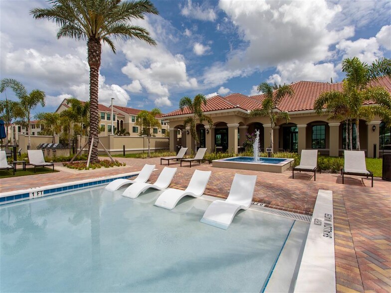 Resort-Inspired Beach Entry Pool with Sundeck. - The Atlantic Palms at Tradition