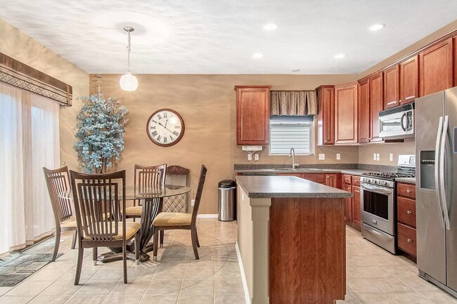 Building Photo - Spacious 4 Bedroom With Modern Comforts & ...