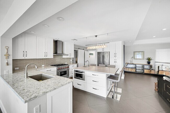 Building Photo - 6767 Tradewind Way