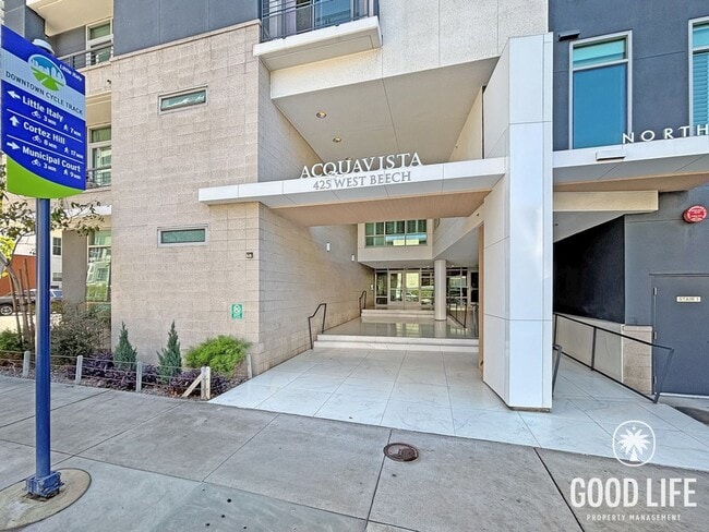 Building Photo - Charming 2BD/1BA Condo in Downtown W/ A/C, W/D, Community Pool, Spa, & Gym!