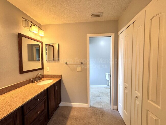 Building Photo - 4818 Breezy Palms Ct