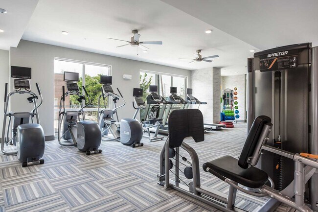 Building Photo - Your Downtown Lifestyle Begins Now