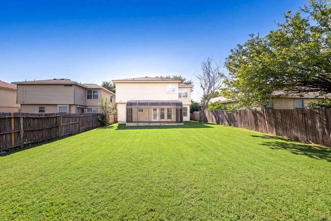 Building Photo - A Waterfall Shower, a Sunroom, and a Story Worth Coming Home To