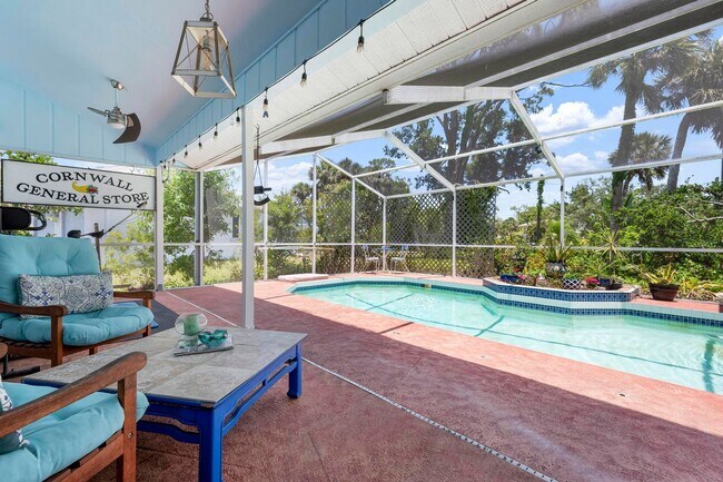 Building Photo - ** STUNNING 4 BEDROOM 2 FULL BATH/ 2 HALF BATH HOME WITH A PRIVATE POOL LOCATED JUST MINUTES FROM...