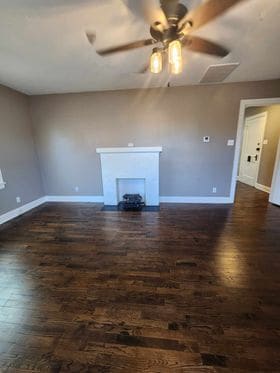 living room fireplace - Adams Apartments