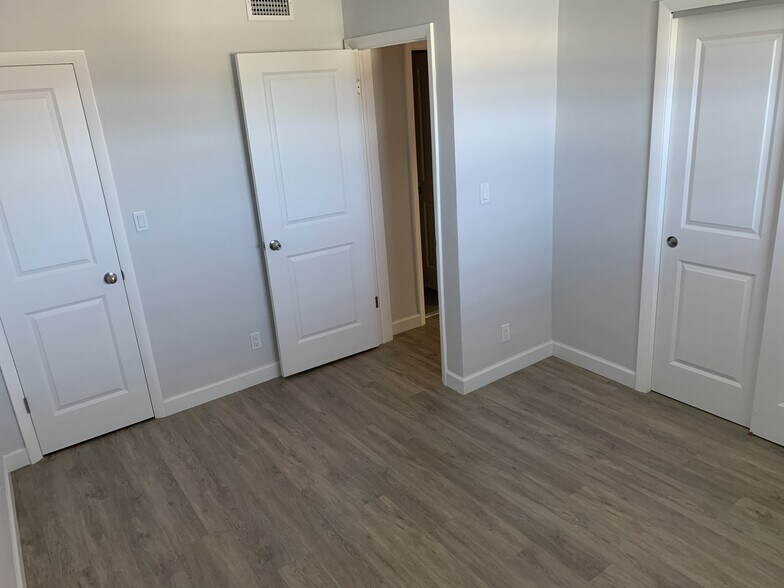 Guest Bedroom Featuring Two Closets with lots of Storage Space - 1400 NE 57th St
