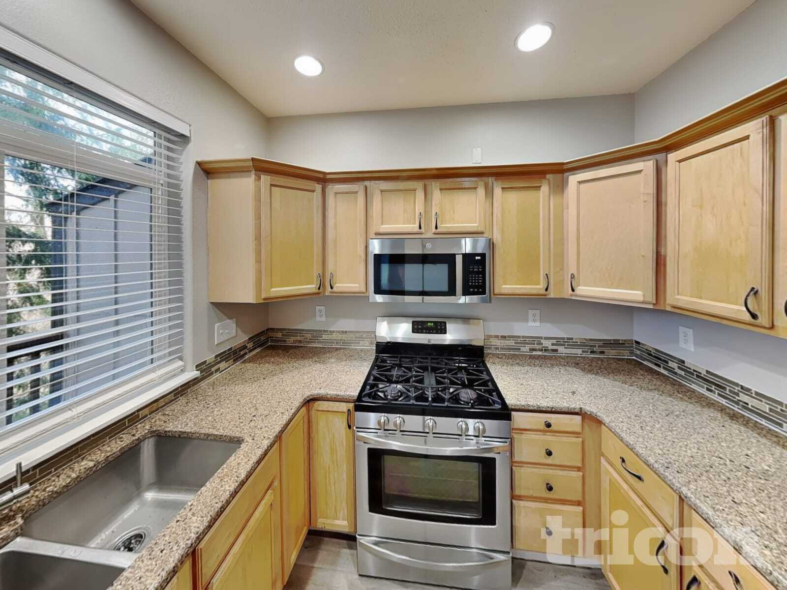 Building Photo - 7535 SW Onnaf Ct