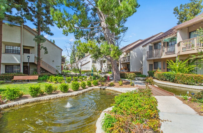 Building Photo - UPGRADED ONE BEDROOM OASIS IN GATED COMMUNITY