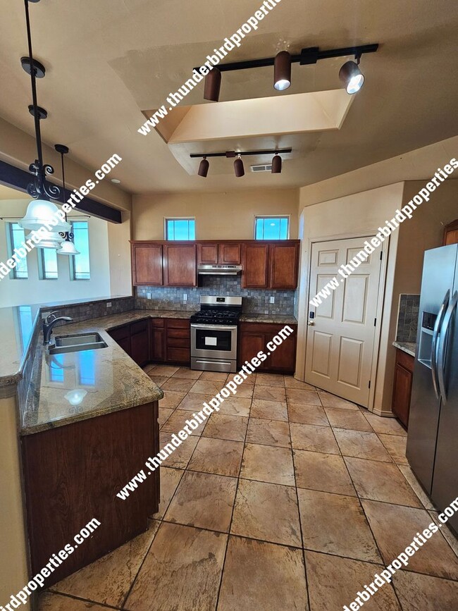 Building Photo - 4 bedrooms, 3 baths, single  story  on  We...