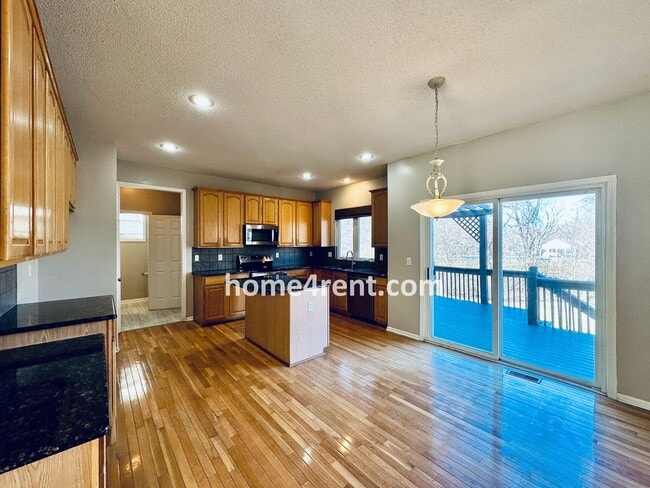 Building Photo - Gorgeous, Updated Home w/ Granite Counters and Wood Floors in Kitchen, Walkout Finished Basement!