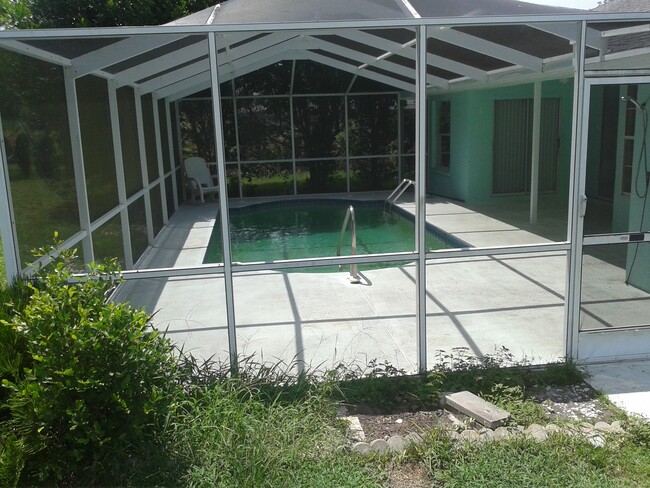 Building Photo - 5592 W Woodside Dr