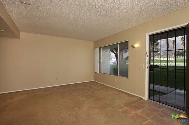 Building Photo - Spacious 4-Bedroom Condo in Indian Canyon ...