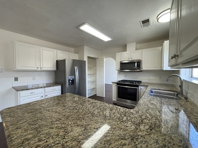 Building Photo - 10538 Olympic St NW