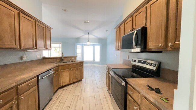 Building Photo - 3/2, 1 AC, Bring Your Boat & RV, Storage Shed + Shop