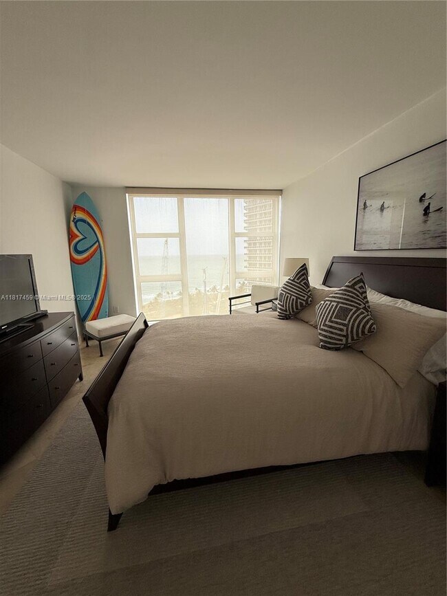 Building Photo - 10275 Collins Ave