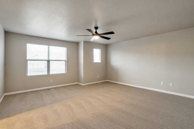 Building Photo - Pet Friendly Townhome w attached 2 car garage