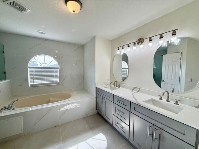 Building Photo - GORGEOUS, Large Completely Renovated Two-Story 4/2.5 PLUS LOFT in POINCIANA VILLAGES!