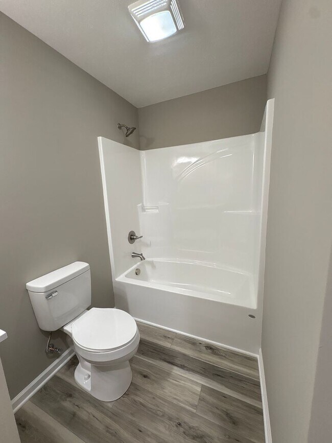 Building Photo - Charming New Home with a Rocking Chair Front Porch!