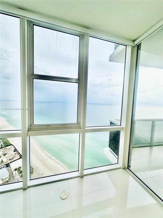 Building Photo - 18201 Collins Ave