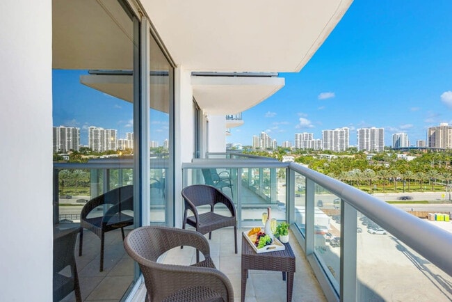 Building Photo - 18683 Collins Ave