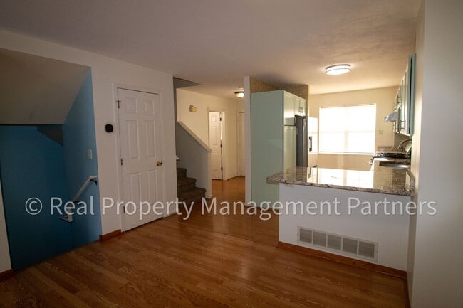 Building Photo - Forest Hills 3 Bed Townhome with Garage, Pond View and Some Utilities Included