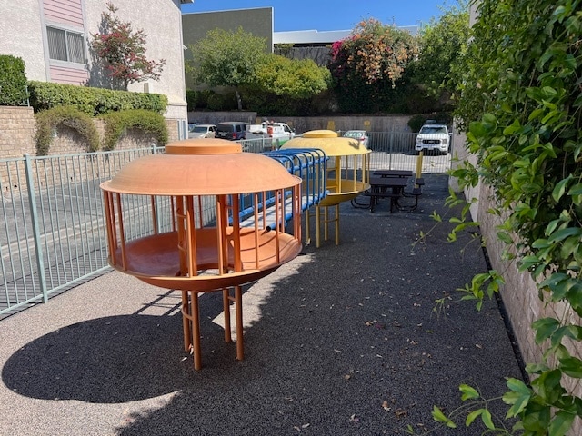 Play area and tables - 13100 Bromont Ave