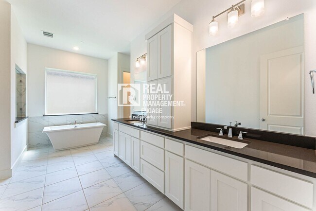 Building Photo - Highly Upgraded Five-Bedroom Home Located ...