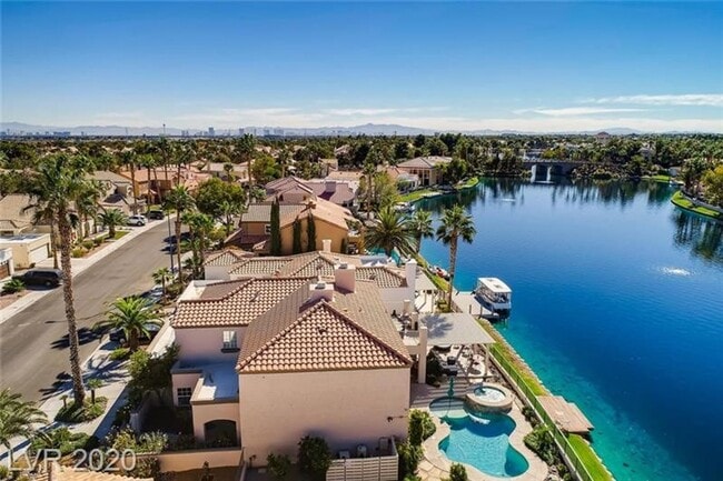 Building Photo - Vegas's Only Available Waterfront Rental ~ 4 Bedroom Desert Shores Lake Front Home