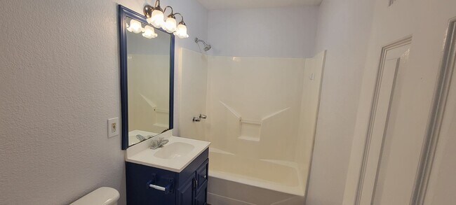 Building Photo - FRESHLY REDONE in 2023 - New floors, fresh...
