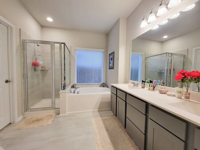 Building Photo - This stunning 2-year-old house with 4 beds, 3 baths, and an attached 2-car garage, it offers ampl...