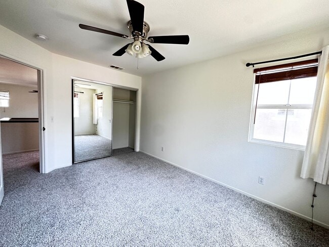 Building Photo - 4 bedroom home. New Carpet!