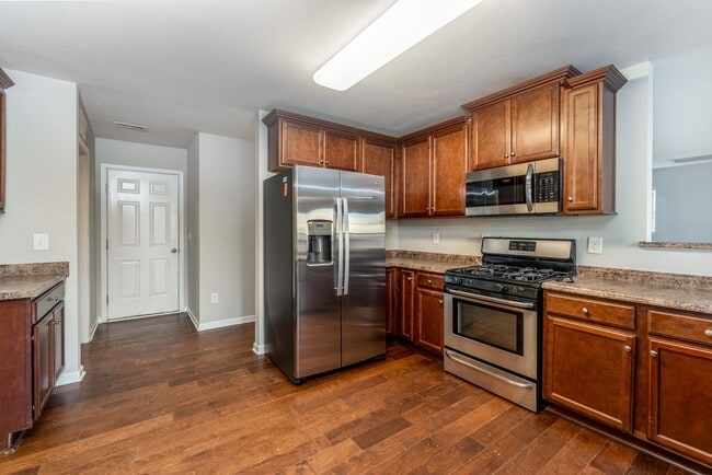 Building Photo - Spacious 5-Bed, 3.5-Bath Residence with 4,003 Sqft, Master on 1st Floor, Elegant Design, & Versat...