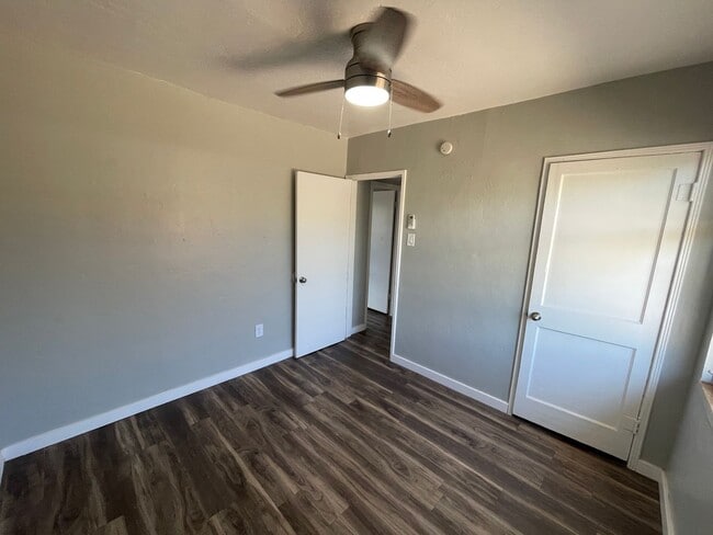 Building Photo - Remodeled Two Bedroom, End Unit with A/C and Large Fenced Yard at La Terraza!!